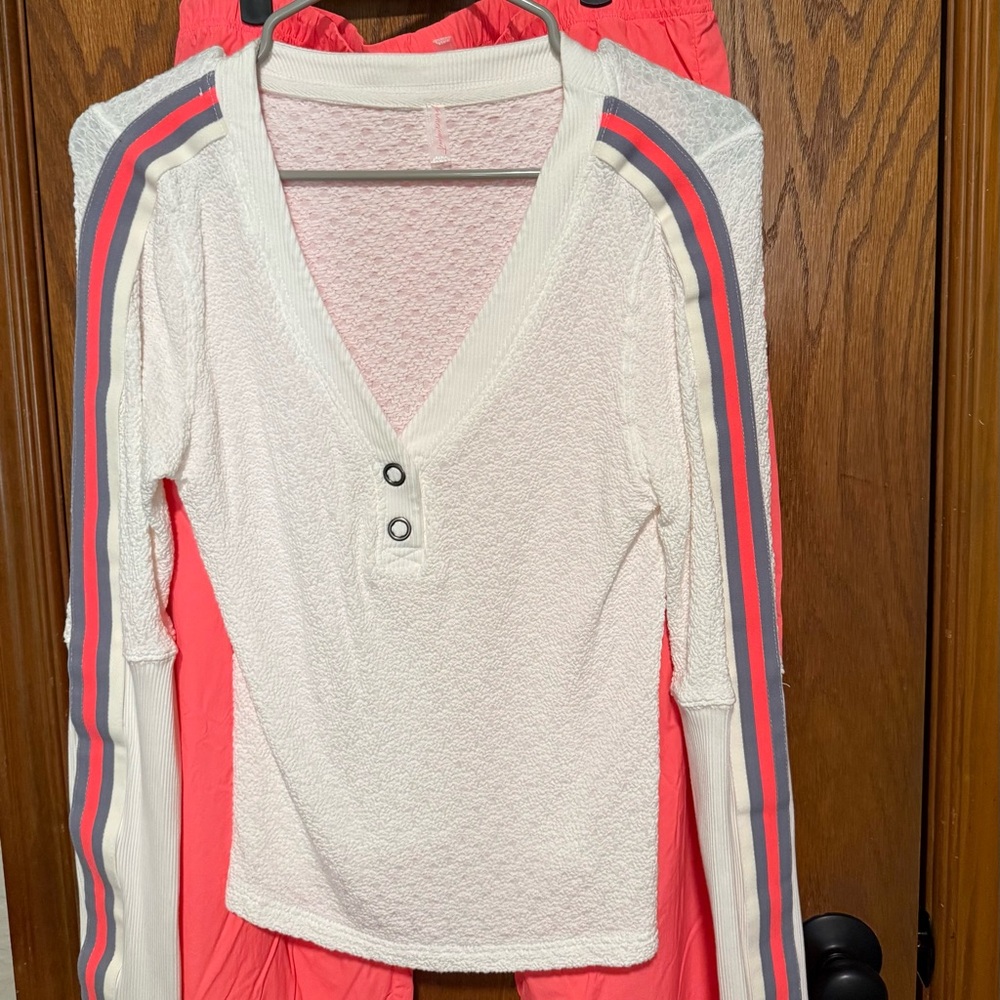 Free People Movement Recovery Layer shirt and Fly by Night pants in neon coral